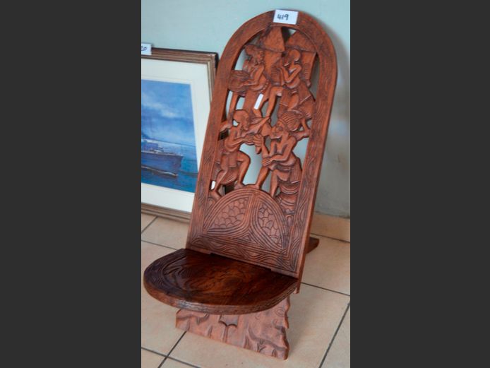 CARVED AFRICAN CHAIR