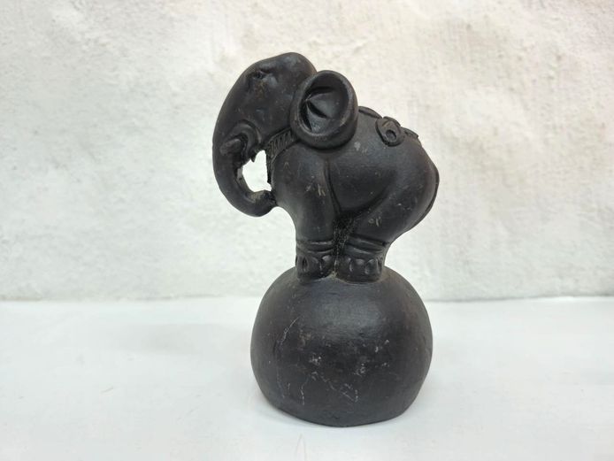 Carved Dark Stone Elephant Standing on Sphere Figurine