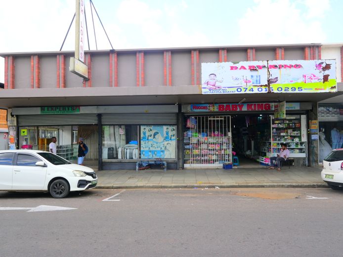RETAIL PROPERTY • CORPORATE DISPOSAL • CBD • MULTI TENANTED • LONG LEASES • HIGH ROI