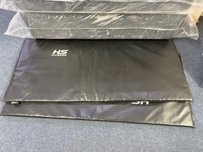 Two black exercise mats