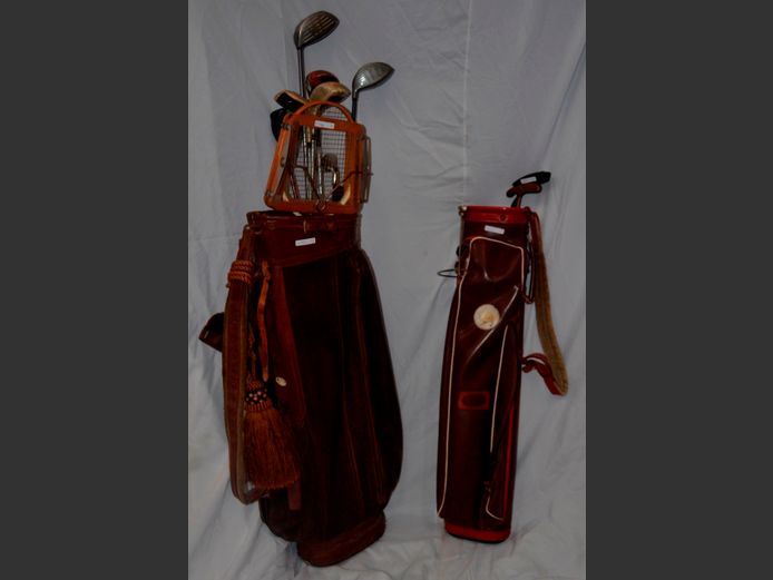 LOT OF 2: VINTAGE LEATHER GOLF BAGS WITH CLUBS