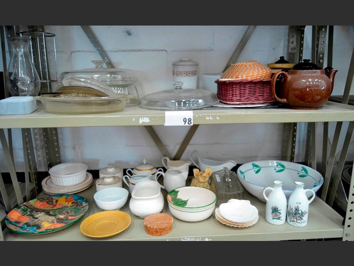 LOT ON 2 SHELVES: TEAPOTS, GRAVY BOAT, SUGAR BOWLS, etc