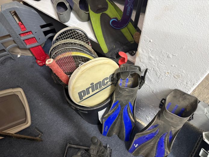 Lot of various sporting equipment (rackets, diving gear, etc.)