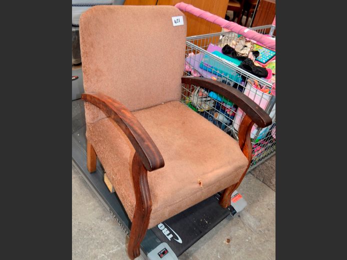 BROWN UPHOLSTERED ARMCHAIR [Seat torn & sunken]