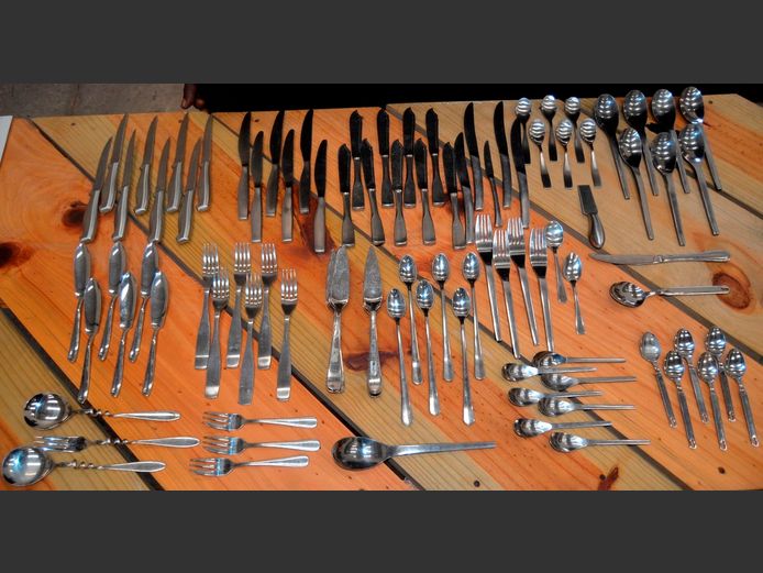 LARGE LOT STAINLESS STEEL CUTLERY: KNIVES, FORKS, SPOONS, STEAK KNIVES, etc