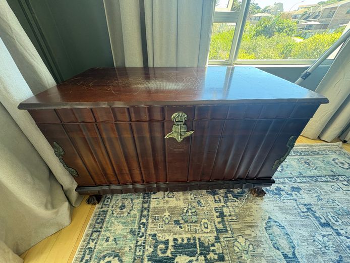 Wooden ball and claw style chest with brass handles and inner shelf