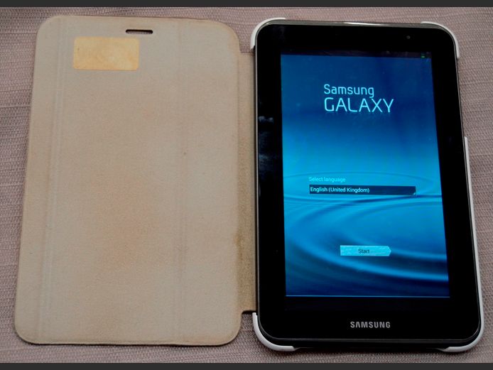 SAMSUNG GALAXY TAB 2 WITH COVER [Switches on, no charger]