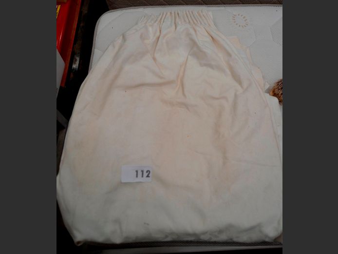 PAIR CREAM LINED CURTAINS