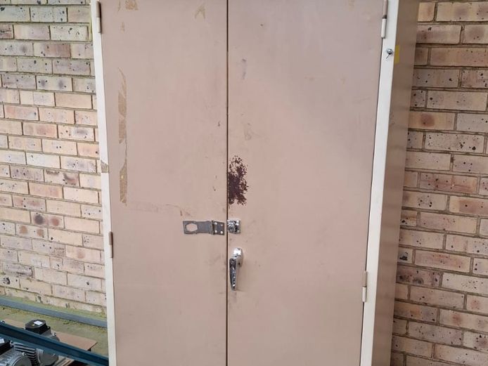 2 Door steel cabinet with contents