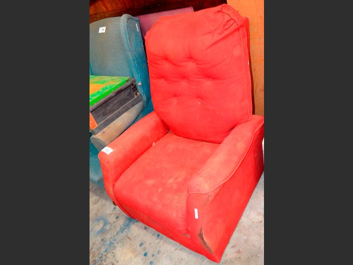 RED UPHOLSTERED RECLINING ARMCHAIR [Needs re-covering]