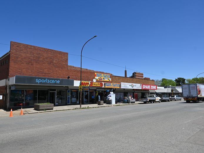 PRIME RETAIL BUILDING • FULLY LET • NATIONAL ANCHORS • SPORTSCENE • BEST ELECTRIC • LONG LEASES • CBD