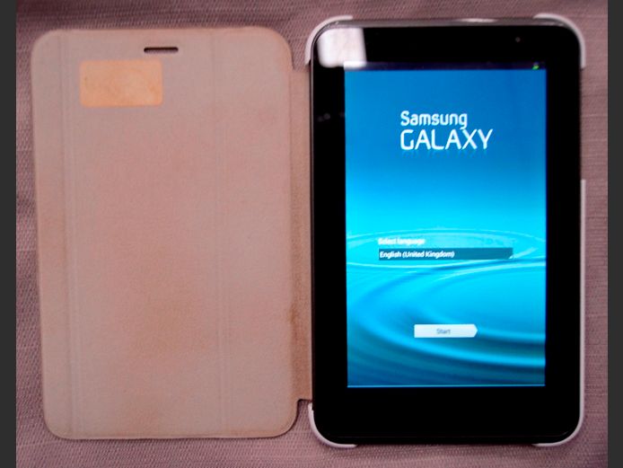 SAMSUNG GALAXY TAB 2 WITH COVER [Switches on, no charger]