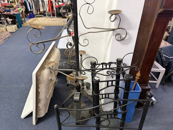 Lot containing huge metal candle stand, metal frames and metal table frames