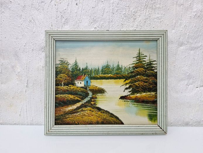 Vintage Landscape Oil Painting – Lakeside Cabin in Ribbed Silver Frame