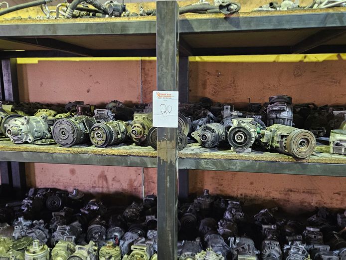 METAL SHELVING WITH VARIOUS COMPRESSORS AND COMPRESSOR PARTS