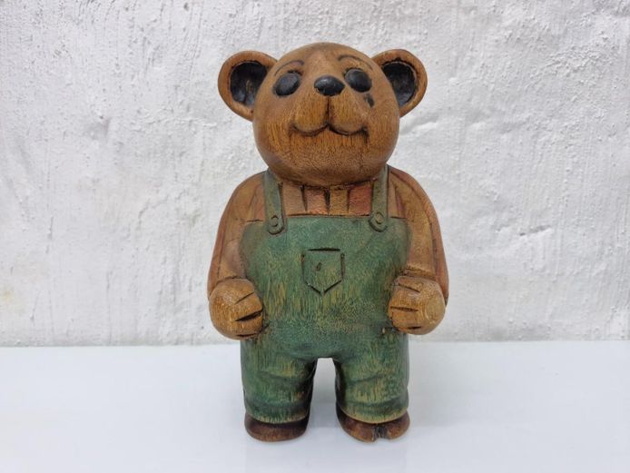 Carved Wooden Teddy Bear Figurine in Green Overalls