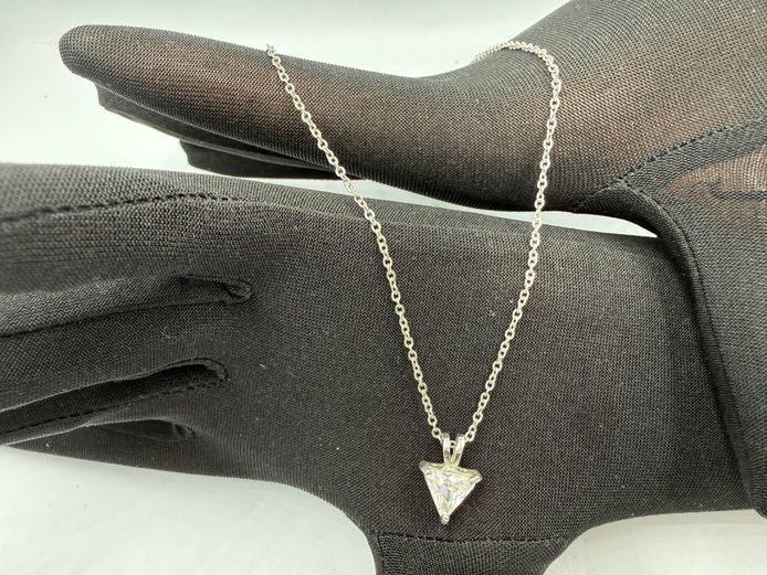 Fine silver coloured necklace with triangular stone pendant