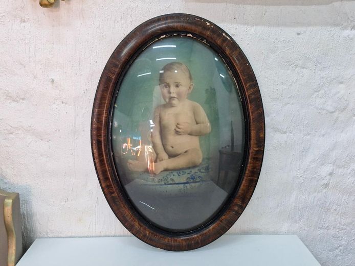 20th Century Hand-Tinted Baby Portrait in Oval Convex Bubble Glass Frame
