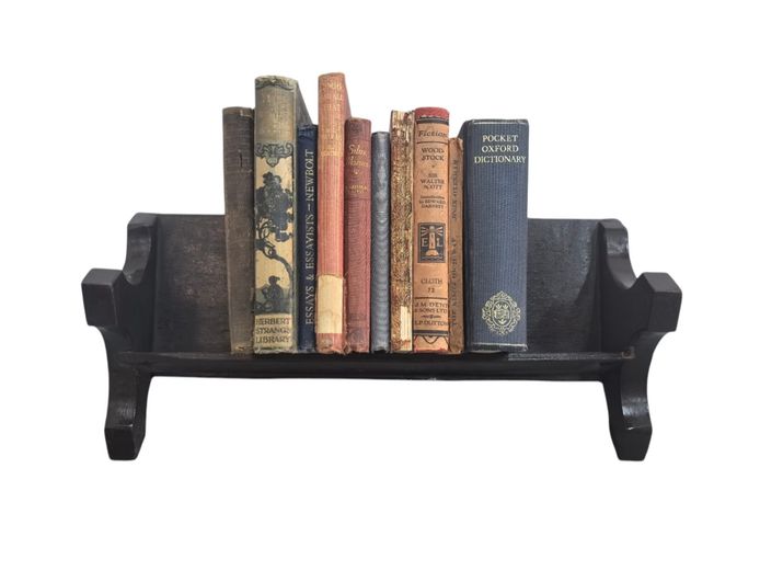 Assorted Vintage Books on Wooden Table Top Book Stand 