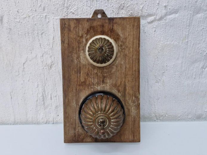 Brass & Ceramic Toggle Light Switches on Wood Backing