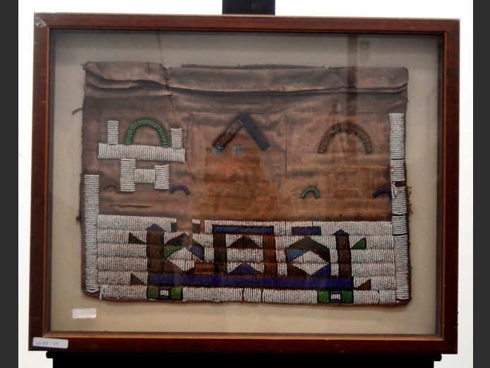 BOX FRAMED VINTAGE LEATHER & BEADED BAG, 45.5 x 33cm