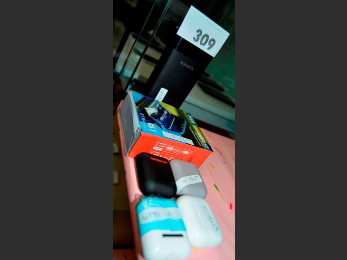 ASSORTED BLUETOOTH EARPODS & A POWER BANK [Untested]