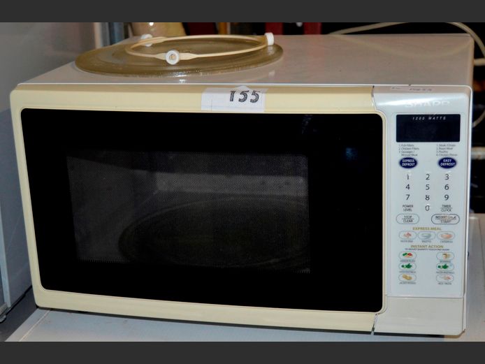 SHARP ELECTRONIC MICROWAVE [Switches on]
