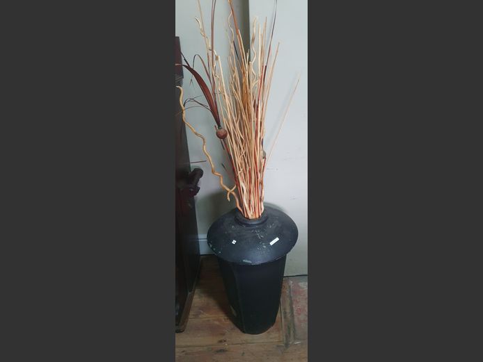 BLACK PAINTED VASE WITH DECORATIVE STICKS