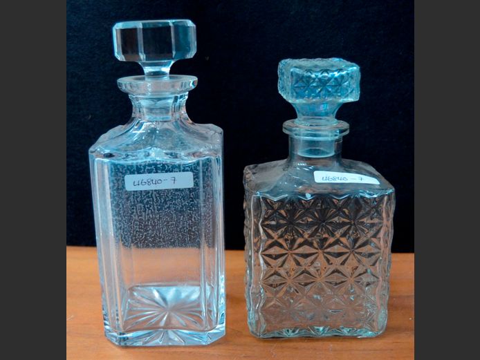 CUT GLASS DECANTER WITH STOPPER & ANOTHER, 24cm & 21cm High