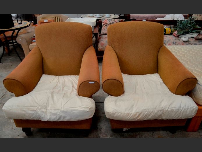 PAIR BROWN UPHOLSTERED ARMCHAIRS [Legs loose & cushion covers needed]