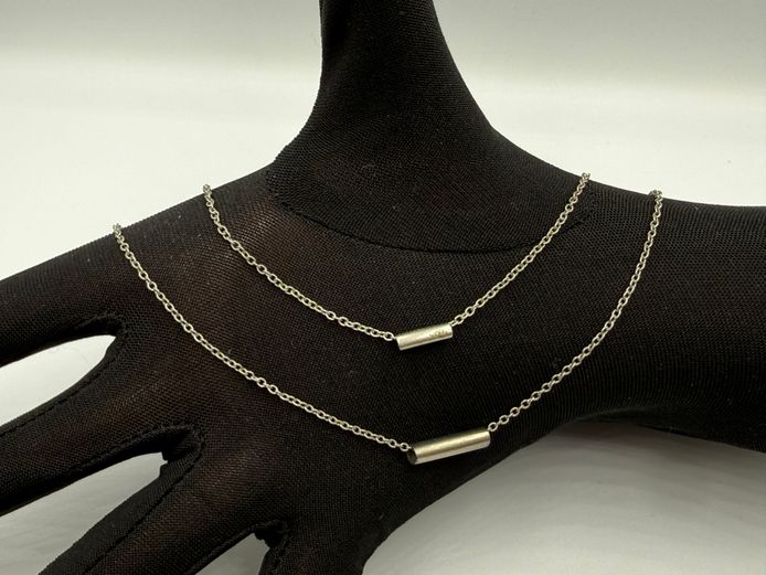 Silver coloured double chain necklace