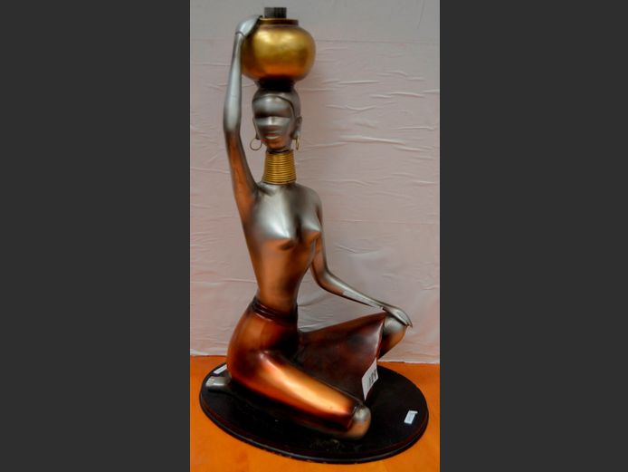 COMPOSITE FIGURINE OF A SEATED LADY, 63cm High [In need of repairs]