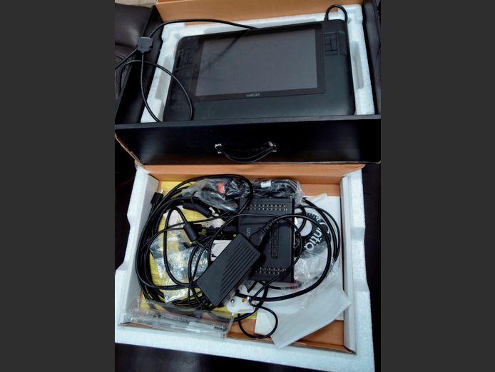 LOT: ELECTRONIC DRAWING TABLE [Switches on, untested further] & A TENNIS RACQUET