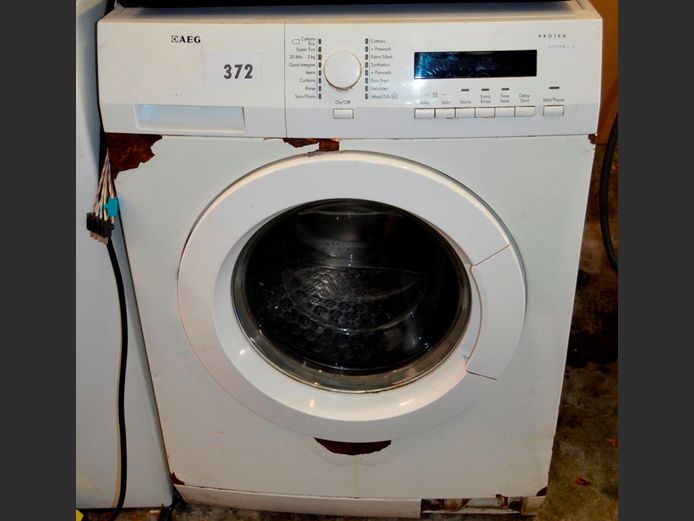 AEG FRONT LOADING WASHING MACHINE [Switches on, untested further, cover missing, rusty]