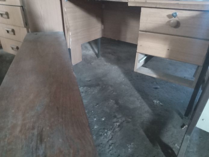 Wooden office desk with long bench