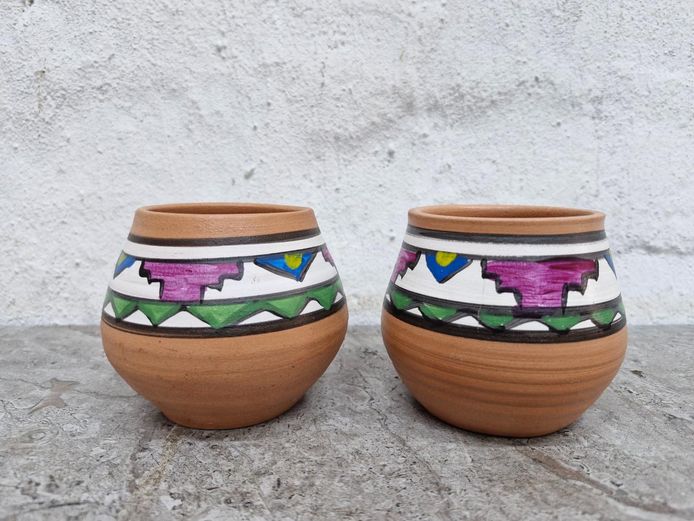 Pair of Hand-Painted Ndebele-Style Terracotta Vessels