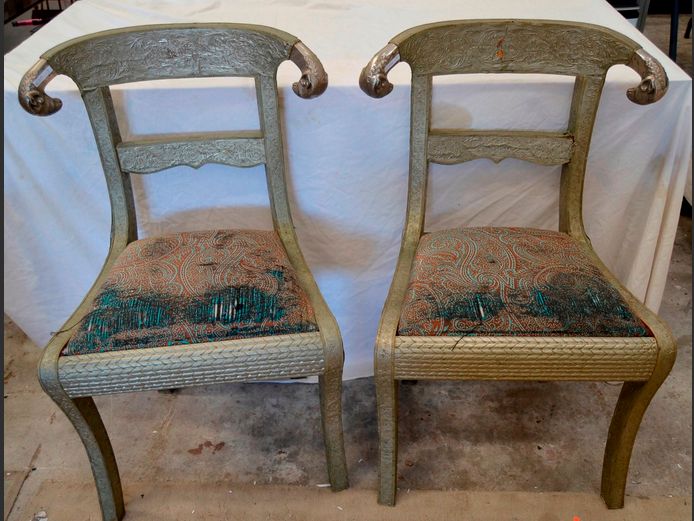 PAIR ANGLO-INDIAN SILVER METAL CLAD CHAIRS WITH RAM'S HEAD ENDS [Needs re-covering]