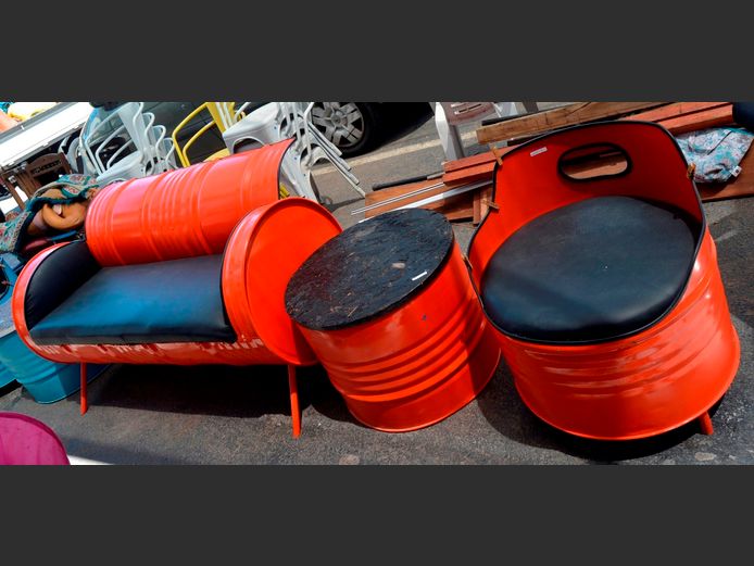 ORANGE PAINTED 2-PIECE, 3-SEATER DRUM PATIO SET WITH MATCHING COFFEE TABLE