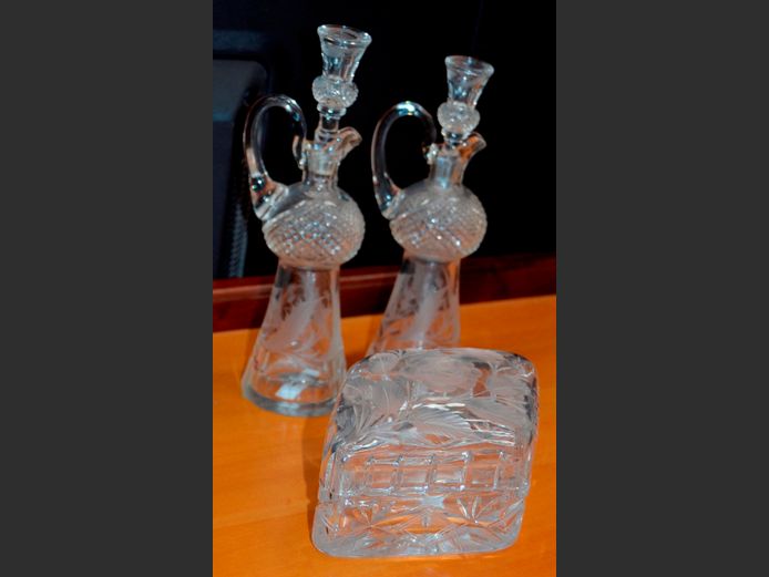 PAIR CUT GLASS OIL & VINEGAR DECANTERS WITH STOPPERS & A CUT GLASS BOWL WITH LID