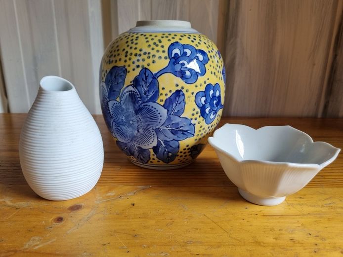 Textured and Patterned Trio: Blue-and-Yellow Floral Vase with White Accents