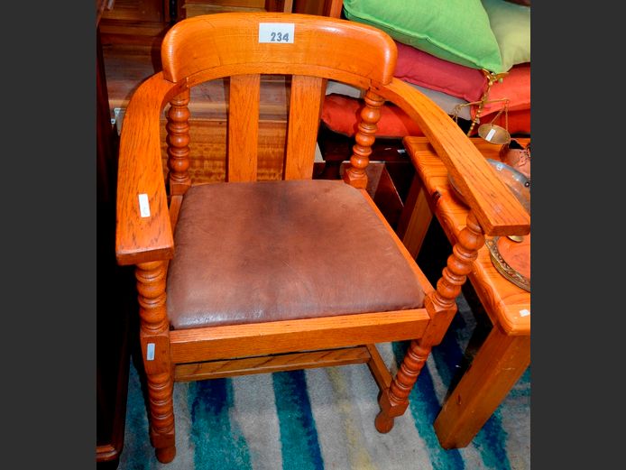 OAK CAPTAIN'S CHAIR WITH BROWN LEATHER SEAT