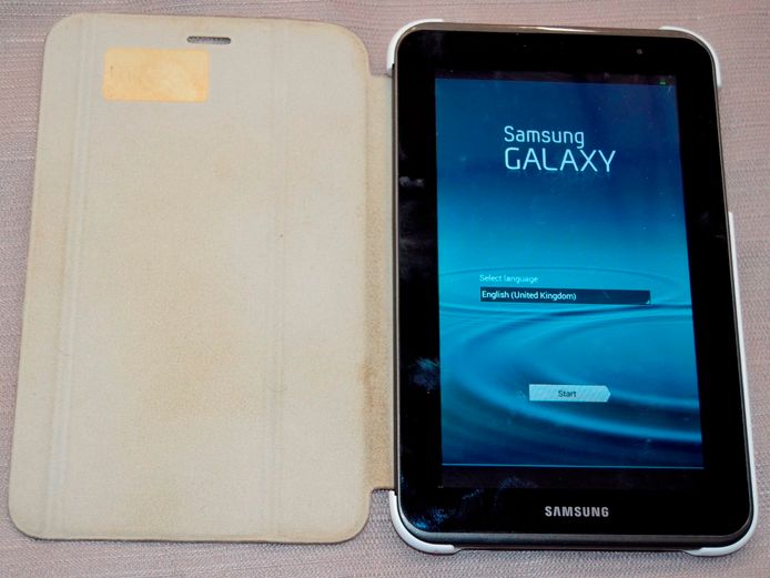 SAMSUNG GALAXY TAB 2 WITH COVER [Switches on, no charger]