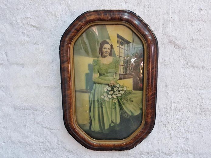 Vintage Hand-Tinted Portrait of a Lady in Green Dress with Woodgrain Frame