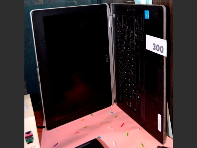 DELL LAPTOP WITH CHARGER [Switches on, untested further]