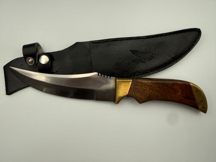 Hunting knife with wooden handle and brass detailing