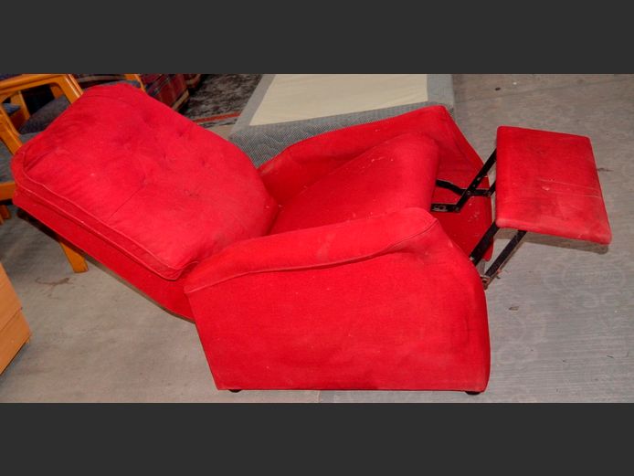 RED UPHOLSTERED RECLINING ARMCHAIR