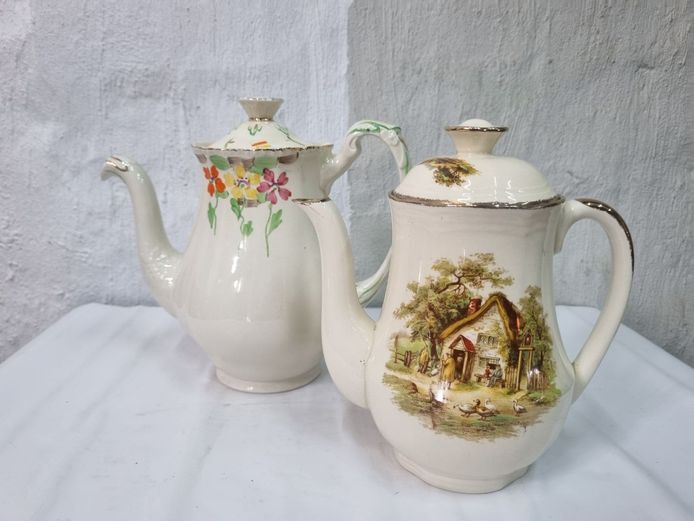 Pair of Vintage Ceramic Teapots with Floral & Cottage Scene Designs