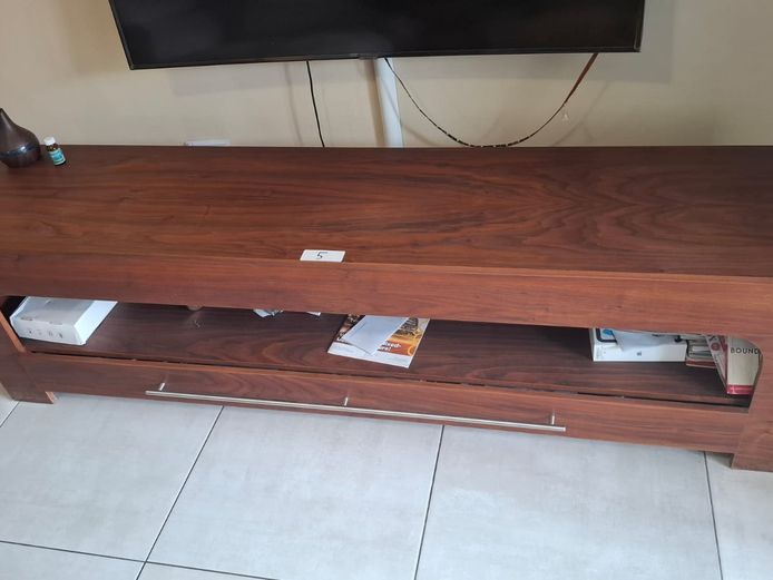 Tv cabinet with contents in drawers