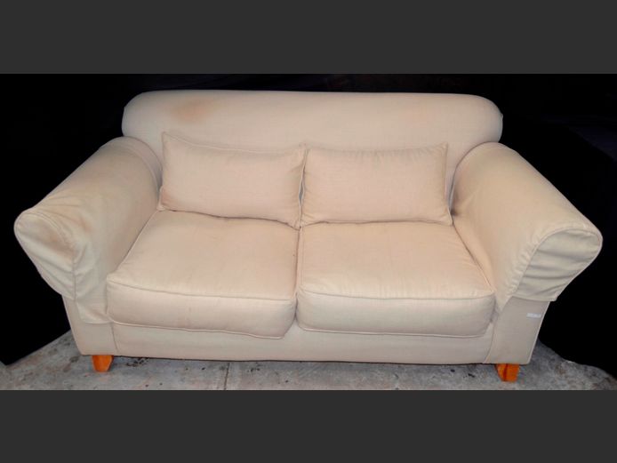 CREAM UPHOLSTERED 2-SEATER COUCH [Needs a clean]